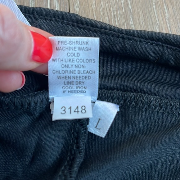 NWT. Lulu-B skort in black. Black shorts under skort. Stretchy material. UPF50+ - Picture 6 of 8